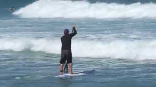 SUP Surf Instruction  How to Paddle Through Breaking Waves [upl. by Guillema53]