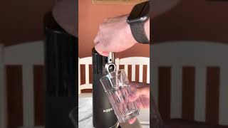 Pouring a regular can of Guinness using a Fizzics Machine [upl. by Enilauqcaj]