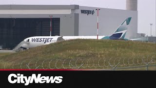 16 WestJet airplanes grounded due to hail damage [upl. by Locke]