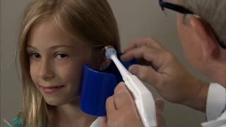 How to Perform an Ear Washout irrigation  ENTOtolaryngology Skills [upl. by Icyaj]