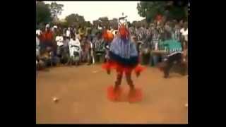 A dancing man on a stick  amazing african tribal dance  Zaouli Dance [upl. by Iniretake210]