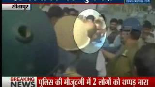 Sitapur Angry SP MLA Rampal Yadav slaps two people in front of Police [upl. by Calendra]