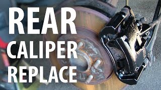 How to Replace rear brake caliper Ford Mondeo Mk3 [upl. by Ahsiekal]