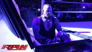 Undertaker rises from a coffin to attack Brock Lesnar Raw March 24 2014 [upl. by Warwick919]