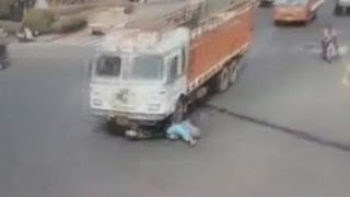 Dramatic crash Trucks runs over woman on scooter [upl. by Maril]