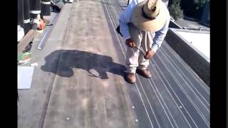 Roll Roofing  how to install a basic flat roof torch down roofing [upl. by Ob]