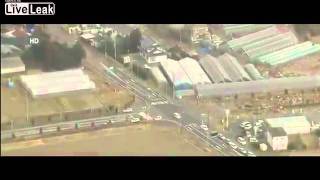 Aerial view of tsunami striking Sendai Japan [upl. by Ahsam]