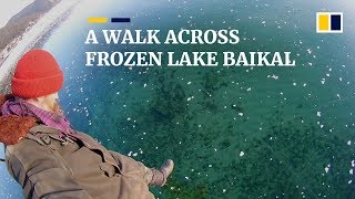 Russian man films thrilling walk across frozen ice on world’s deepest lake [upl. by Draper985]