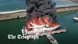 Yacht worth £6m goes up in flames in Torquay [upl. by Luana]