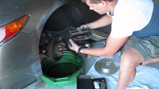 How to replace brake pads and rotors on Honda Civic 2007 part 1 [upl. by Naara]