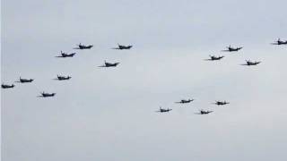 Duxford 16 Spitfire flypast [upl. by Anaihr]