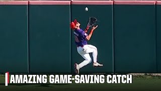 UNREAL Willie Maysstyle gamesaving grab by the Clemson centerfielder 🤯  ESPN College Baseball [upl. by Anoerb]