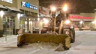 Snow Removal CAT loaders Plowing Snow [upl. by Banwell]