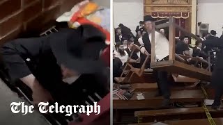 Riot breaks out in New York City synagogue over secret tunnel [upl. by Truc395]