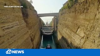 Cruise ship makes tight squeeze through canal [upl. by Conchita910]