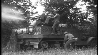 A soldier loads and fires a multiple 50 caliber machine gun on an M16 motor carrHD Stock Footage [upl. by Htir461]