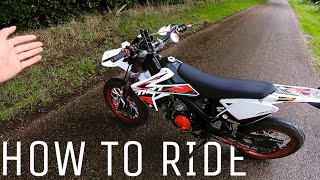 How To Ride A Geared 50cc Motorbike  50cc Supermoto [upl. by Hooper]