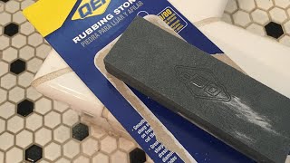 Smoothing sharp bathroom tile with QEP rubbing stone A [upl. by Caesaria]