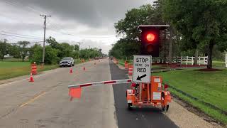 Automated Flaggers Help Keep Construction Workers Safe [upl. by Cordeelia]