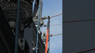 Grounding a high voltage wire with induction substation electrical maintenance [upl. by Bruning]