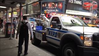 NEWER NYPD TOW TRUCK GIVING A CHARGE TO A NYPD TRAFFIC SUPERVISORS UNIT IN TIMES SQUARE NYC [upl. by Neelcaj12]