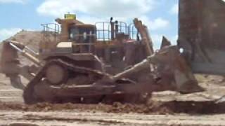 Two dozers moving a large dragline bucket [upl. by Yenot208]