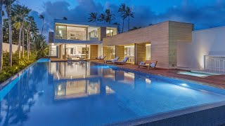 AwardWinning Kahala Oceanfront Estate Tour A Modern Beach Surf Retreat [upl. by Rellia248]