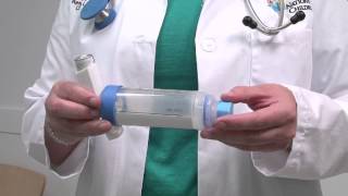 Asthma howto How to use an inhaler with a spacer and mouthpiece [upl. by Herculie]