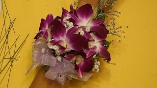 How to make a wrist corsage with dendrobium orchids [upl. by Yttam]