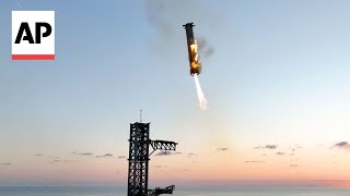 WATCH SpaceX catches Starship rocket booster back at the launch pad [upl. by Alexandr]