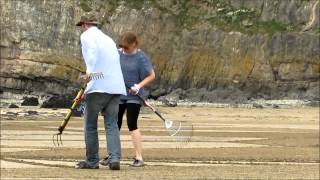 Sand artist creates crop circle on Brean beach [upl. by Emelen]