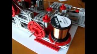 Trafo wikkelmachine van Fischer Technik transformer winding machine [upl. by Bridges838]