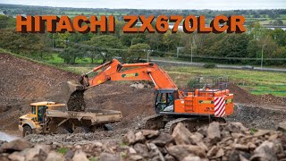 Hitachi ZX670 loading stone on a road project [upl. by Araid]