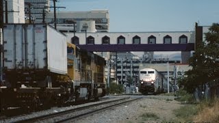 Amtraks California Zephyr 5 passes UP trailer train at street level in Reno NV [upl. by Ardyce]