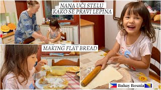 Nana uči Stelu kako se pravi lepina  Grandma teaching Stella how to make Balkan flat bread [upl. by Anglim2]