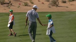 Tiger Woods’ littlest fans help him putt on hole No 16 at TPC Scottsdale [upl. by Assirok337]