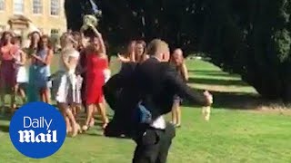 Boyfriend RUNS FOR THE HILLS as girlfriend catches wedding bouquet [upl. by Zebaj415]