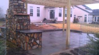 Outdoor living space fireplace pergola pond by Corad Outdoor Living and Home Improvement [upl. by Yetac]