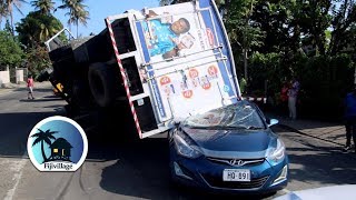 Speeding Truck Overturns and Crushes 2 Cars [upl. by Sum]