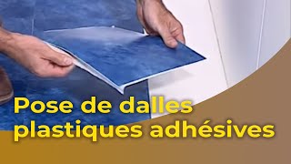 La pose de dalles plastiques adhésives [upl. by Rubina]