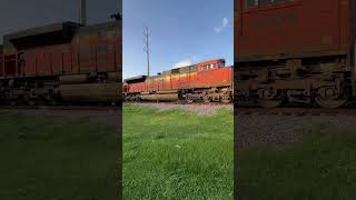 Spotted this BNSF trio with a noseless h2 leading a grain train leaving BNSF Casey yard [upl. by Mcquade]