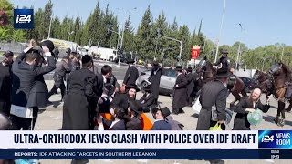 UltraOrthodox Jews riot outside of main IDF drafting center [upl. by Atinhoj]