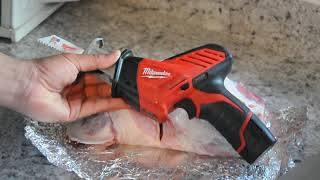 Cutting through bone in meat with sawzall [upl. by Cato]