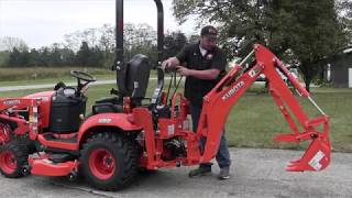 How to Remove the Backhoe on a Kubota BX23s [upl. by Cave918]