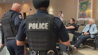 Police called public barred from city hall as councillors criticized over homelessness lawsuit [upl. by Noxid]