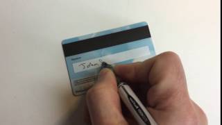 A plastic membership card with a signature strip [upl. by Jarlath]