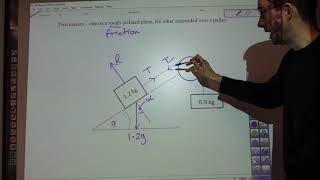 A Level Maths  Mechanics  Connected particles on an inclined plane 1 [upl. by Ellertnom]