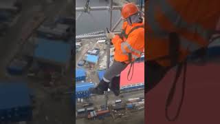 Scaffolder Hanging Scaffolding scaffolding scaffold construction fallprotection [upl. by Loralee231]